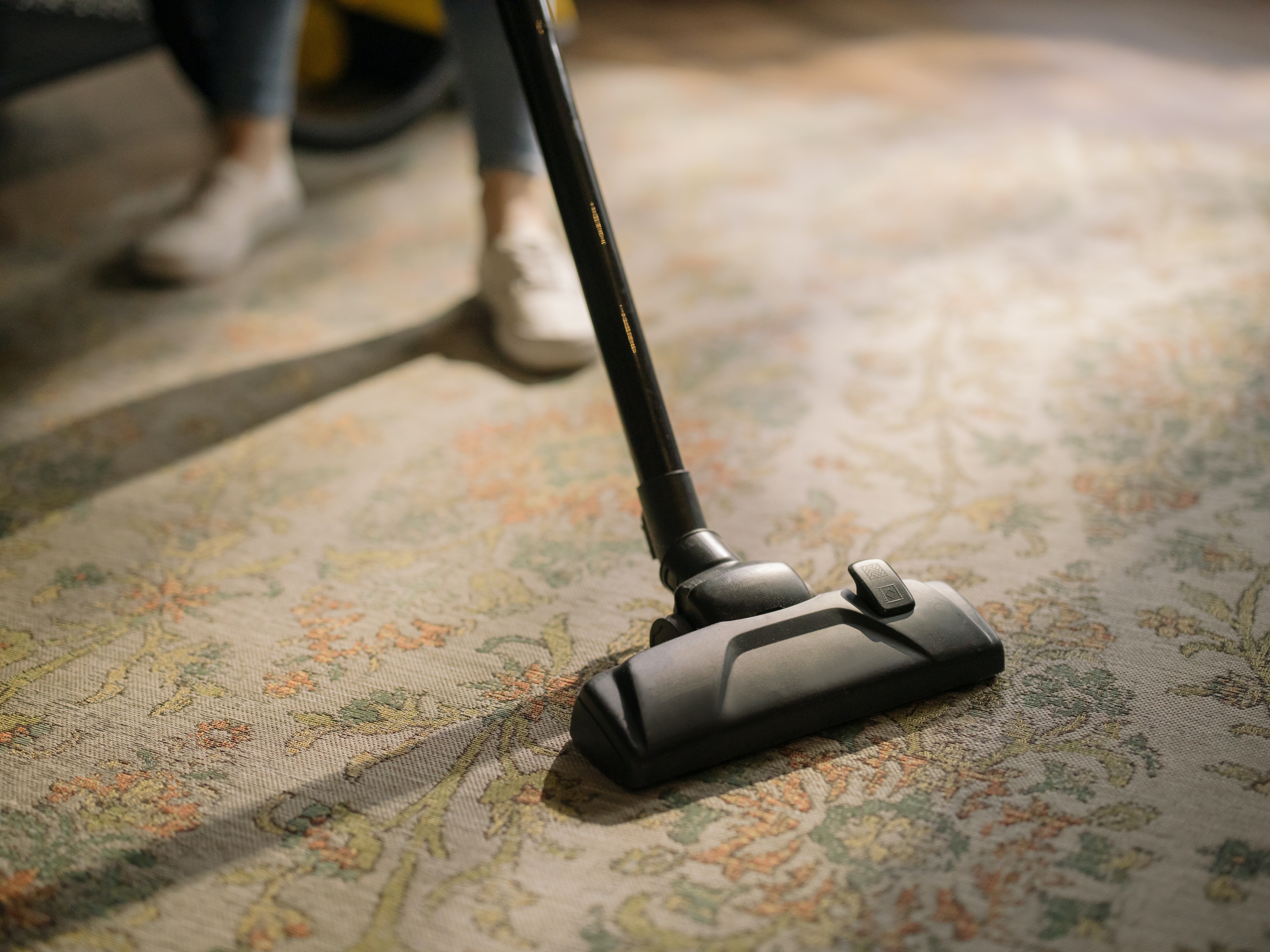 Vacuuming a rug